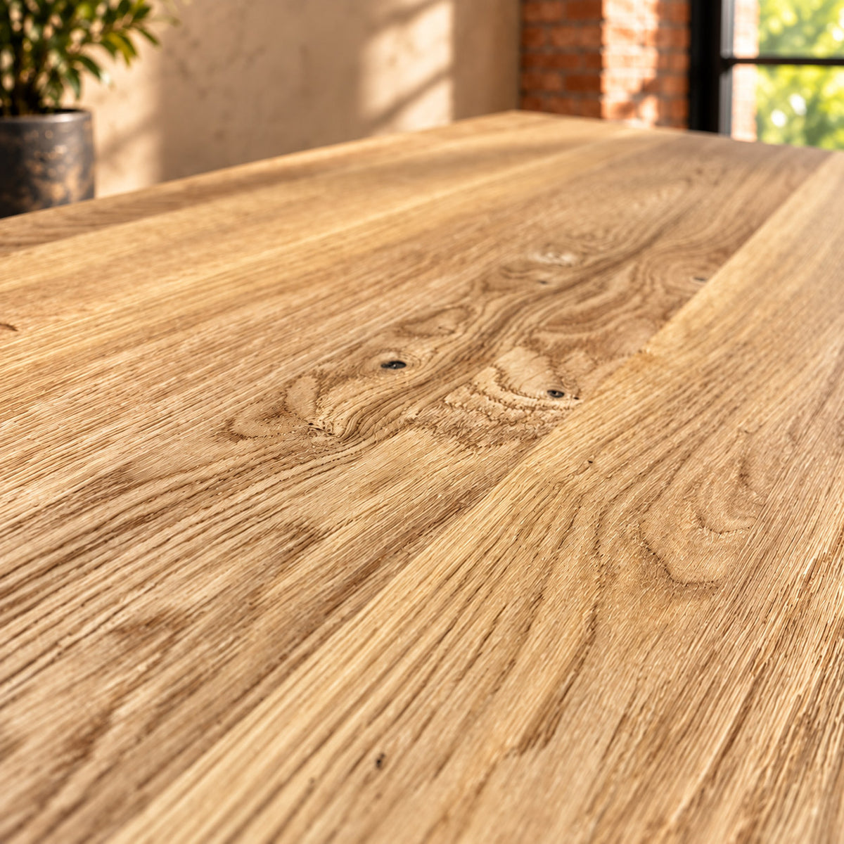 Close-up of the natural grain and knots in the Fusion Oak sideboard’s oak top.