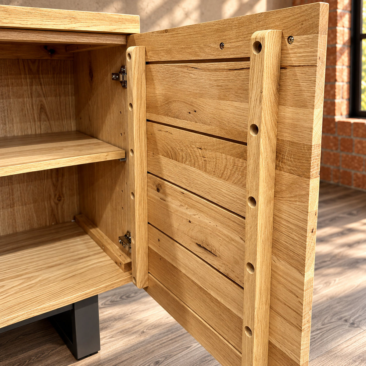 Close-up inside the Fusion sideboard showing vertical timber door braces, concealed hinges and a cupboard shelf.