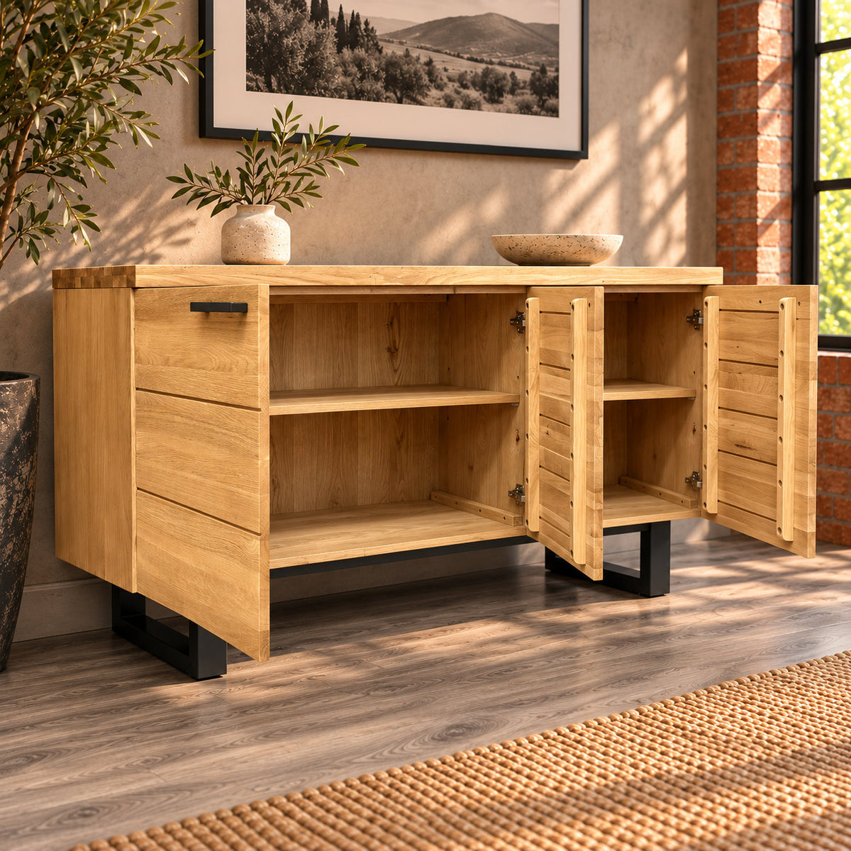 Angled view of the Fusion sideboard with its doors open, showing the storage shelves and timber door bracing.