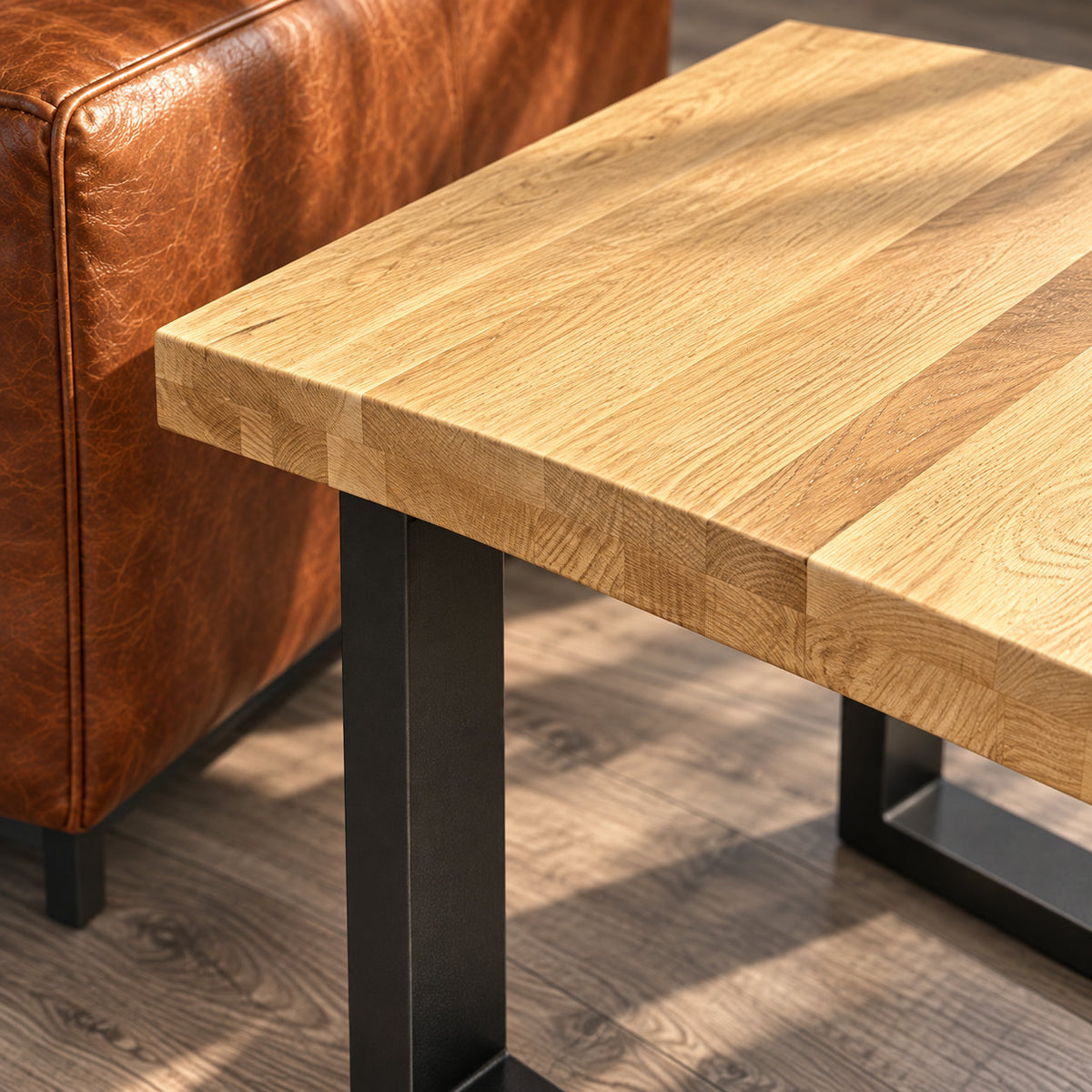 Close-up of the Fusion lamp table's oak corner, showing joined boards, end grain and subtly textured top.