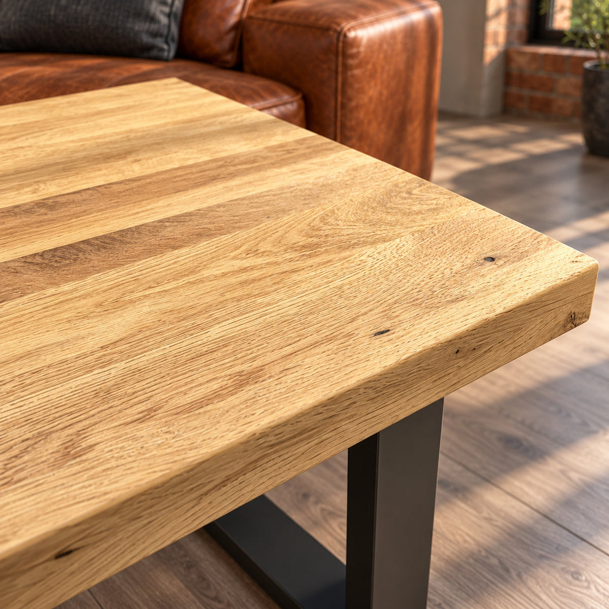 Close-up of the Fusion lamp table's sandblasted oak surface, showing subtle raised grain and shallow recesses.