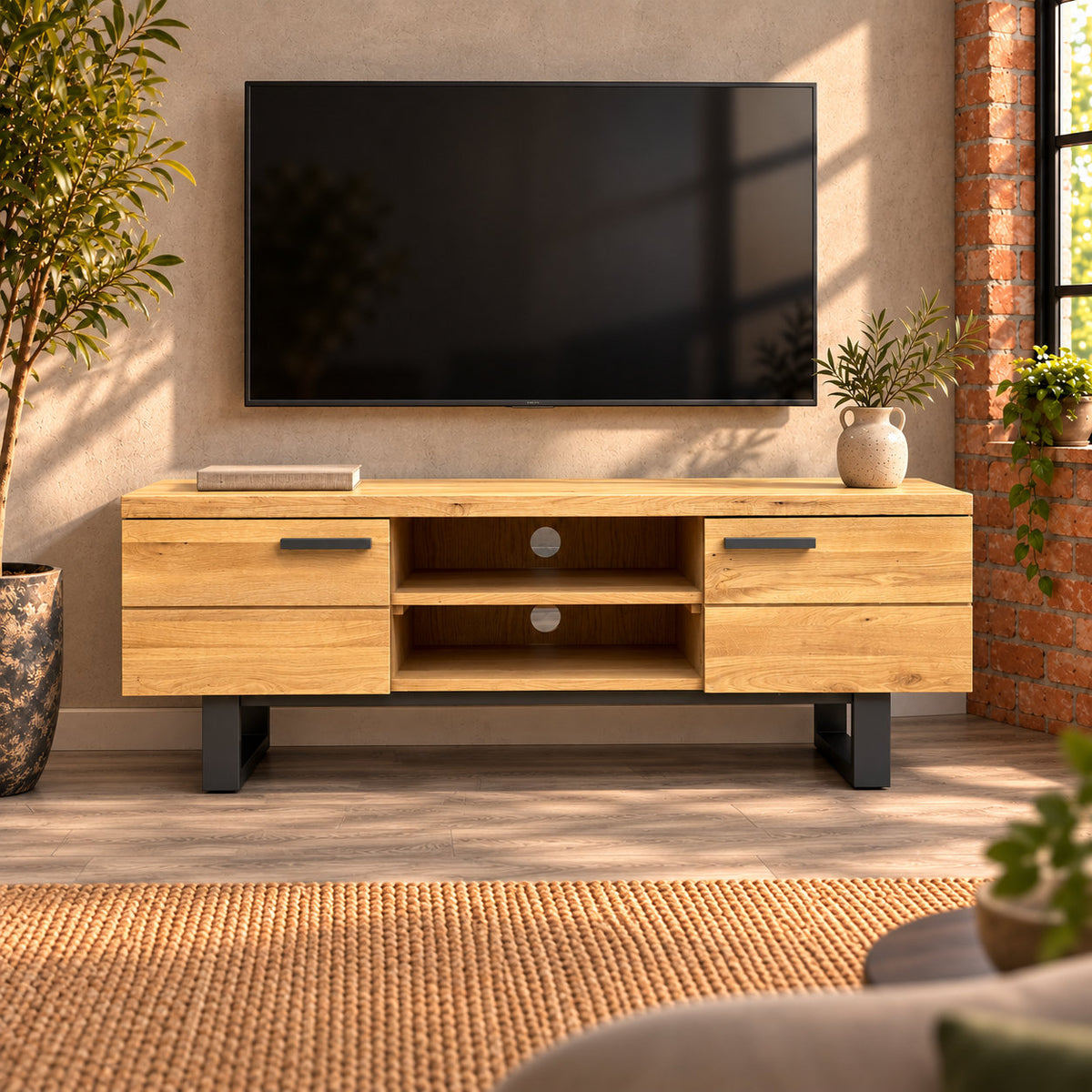 Front view of the compact Fusion oak TV unit with charcoal handles, two open compartments and metal loop legs.