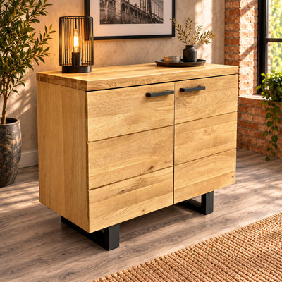 Fusion Oak 2 Door Sideboard FS2SB styled with a black metal lamp and dark tray in a warm industrial room.