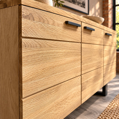 Close-up of the Fusion sideboard's oak door fronts, showing the grain and shallow horizontal grooves.