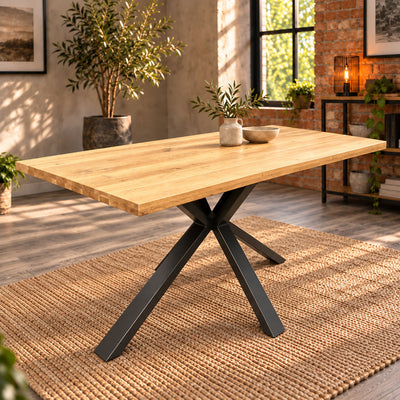 Fusion oak compact dining table with a sandblasted oak top and charcoal central pedestal in a warm industrial room.