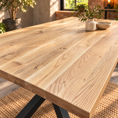 View along the compact Fusion dining tabletop highlighting lengthwise oak grain and the sandblasted surface.