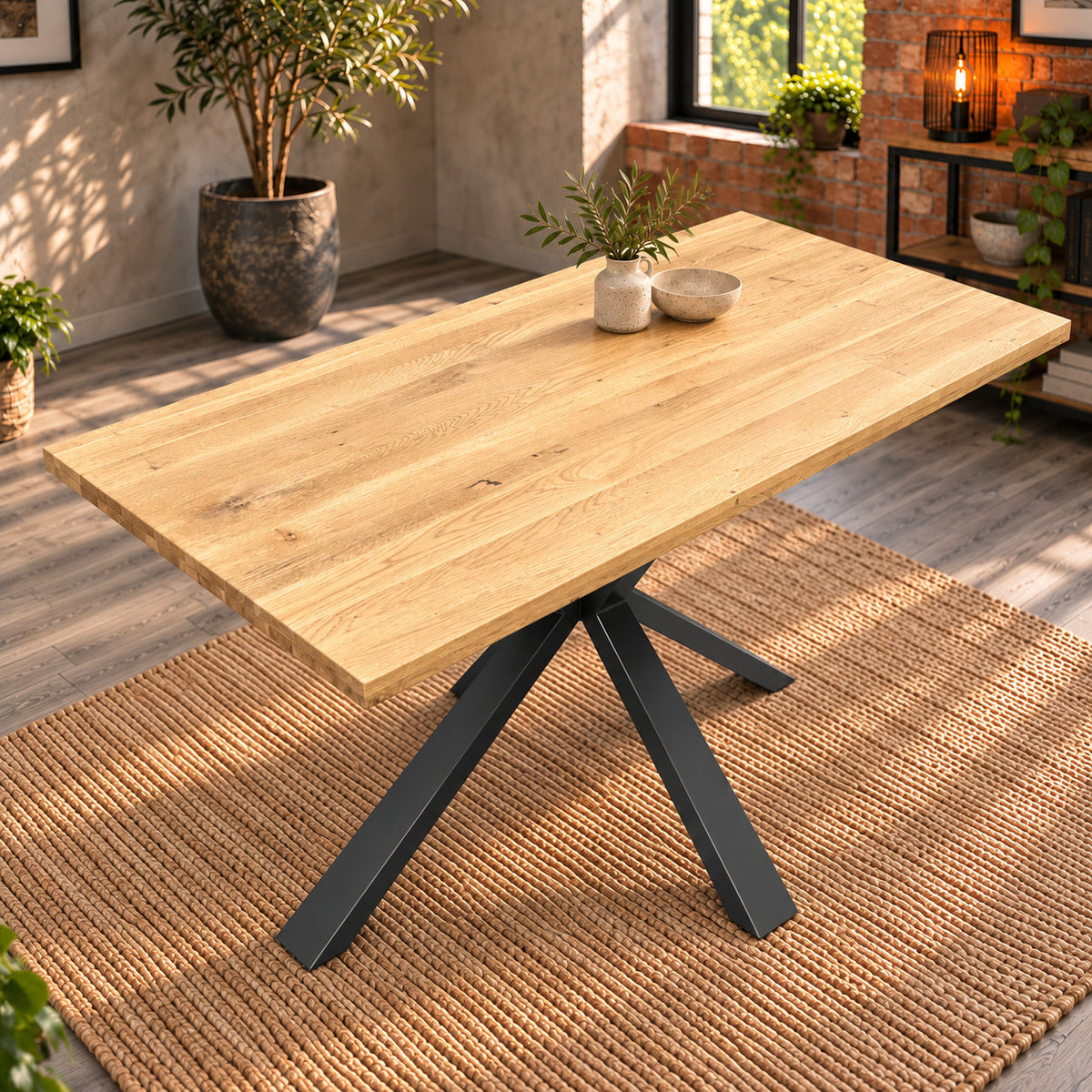 High-angle view of the compact Fusion dining table showing the oak tabletop styled with a small vase and bowl.