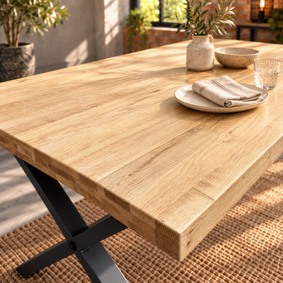 Sandblasted Fusion oak tabletop styled with a cream plate, folded linen napkin, clear glass and ceramic vase.
