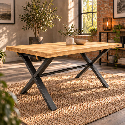 Fusion oak small dining table with a sandblasted oak top and charcoal cross legs in a warm industrial dining room.