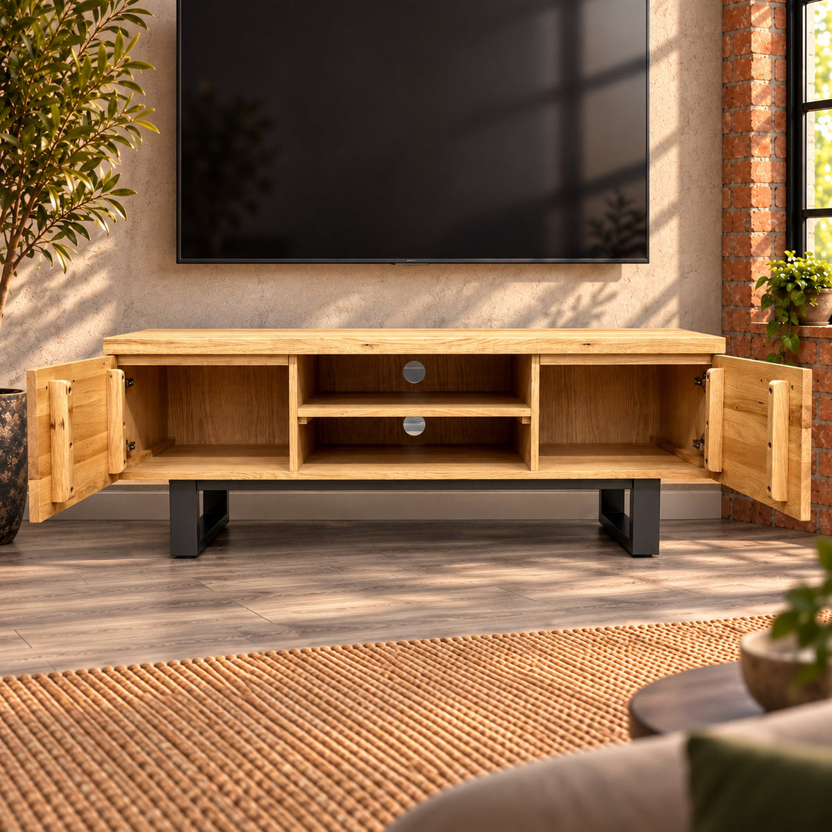 Fusion oak TV unit with both doors open, showing two undivided cupboards and a central shelf with cable holes.

