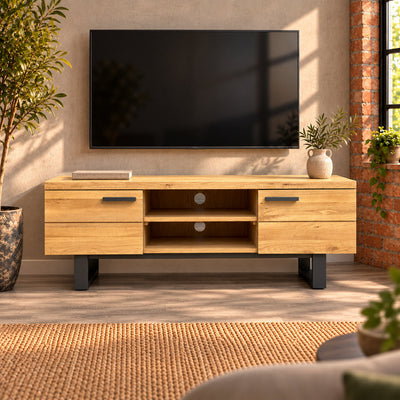 Front view of the compact Fusion oak TV unit with charcoal handles, two open compartments and metal loop legs.
