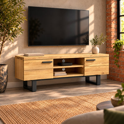 Fusion oak TV unit beneath a wall-mounted television, with books in the lower central compartment and a small media box above.
